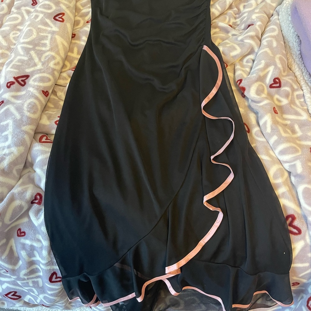 Black with pink dress with a long ruffle